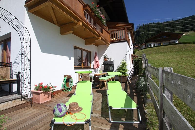 Terrace deck chairs at the Elfriede Gerlos guesthouse in Tyrol